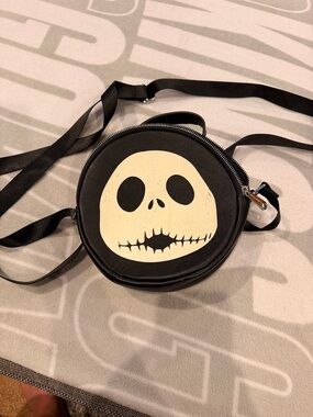 Disney Black Round Crossbody Bag with glow in the dark Jack Skellington Face